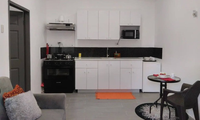 Woodbrook Apartment | Compact modern unit close to entertainment center