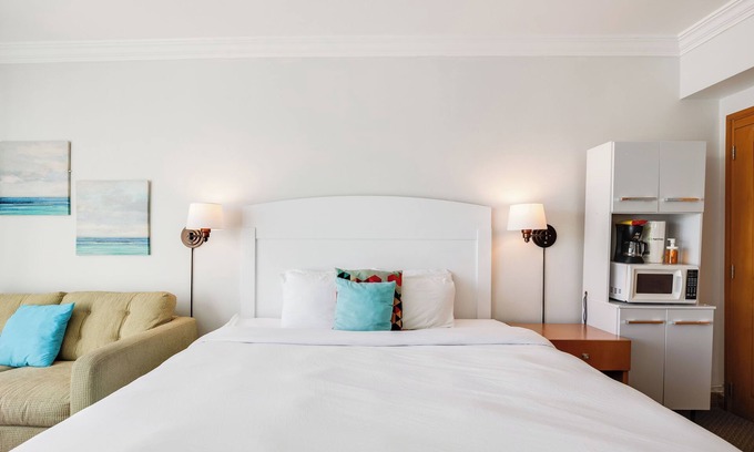 San Juan Antiguo Apartment | Condado Area | Balcony with Beach & Dusk Views | On-site Pool