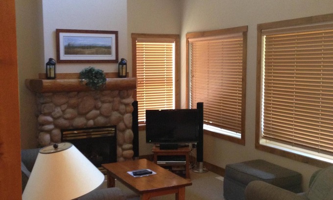 East Kootenay Condo | Condo with a mountain view from private hot tub at the base of the ski hill