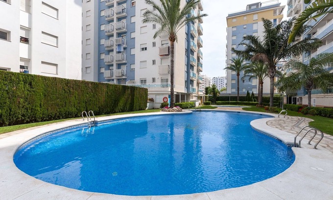 Grau i Platja House | CORALINA - Apartment with shared pool in Playa de Gandia. Free WiFi