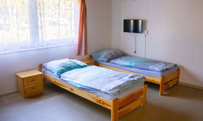 Hradec Kralove House | Cosy apartment in villa for 12 people with WIFI, TV, patio and pets allowed