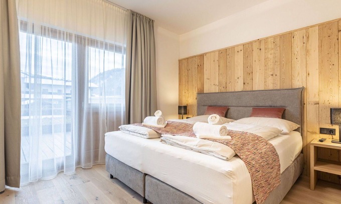 Reith bei Kitzbuehel Apartment | Cosy apartment for 6 guests with WIFI, hot tub, TV, balcony and parking