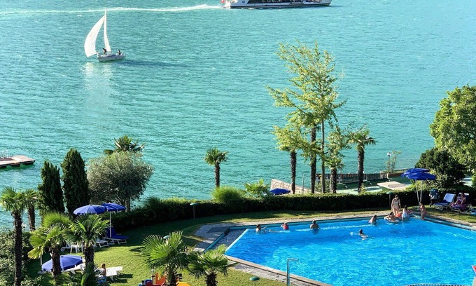 Bigogno Apartment | Cosy apartment for 3 guests with pool, WIFI, A/C, TV, balcony and parking