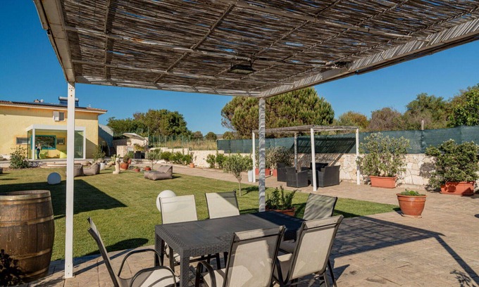 Eden Beach Villa | Cosy apartment in villa for 11 people with pool, A/C, WIFI, TV, patio, pets allowed and parking