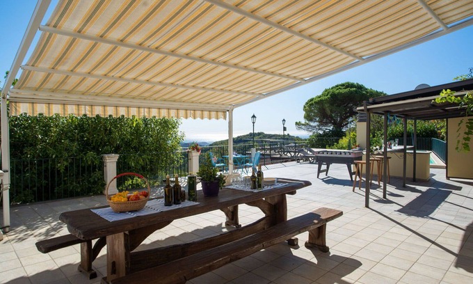 Valloria Apartment | Cosy apartment for 30 people with hot tub, A/C, WIFI, pool, TV, patio and parking