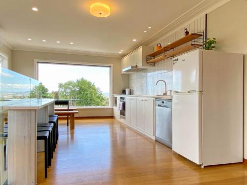 Massey House | Cosy family house in Massey with Good View