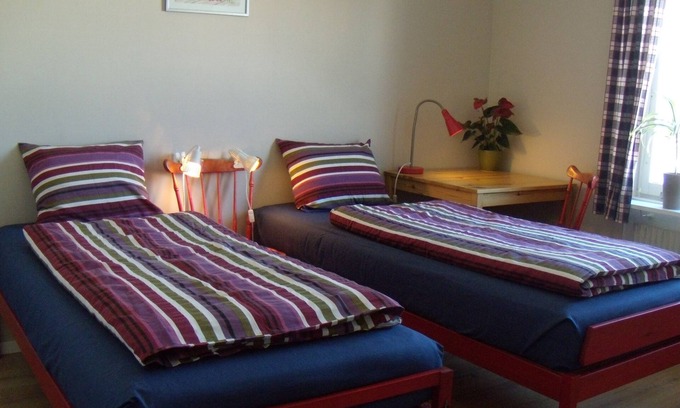 Umea House | Cosy guest room with private guest bathroom