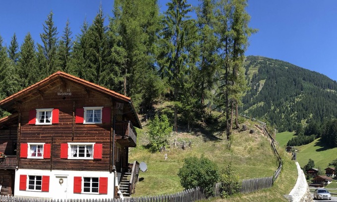 Litziruti Ski Chalet | Cosy ski retreat Swiss Alps 10 min to Arosa Sleeps 6. Spectacular mountain views