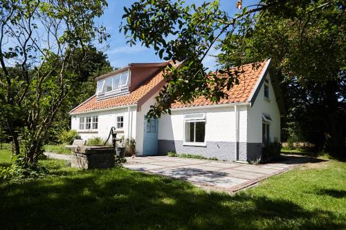 Oostvoorne House | Cottage Duinroos - Dune Rose