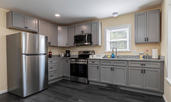 Guild Apartment | Cozy 2-bedroom apt 4 innLakes Region with AC, WiFi, Pet friendly 2 queen beds