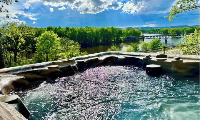 Lansing Township Cabin | Cozy 3-bedroom cabin - sleeps 10- HOT TUB- river viewn