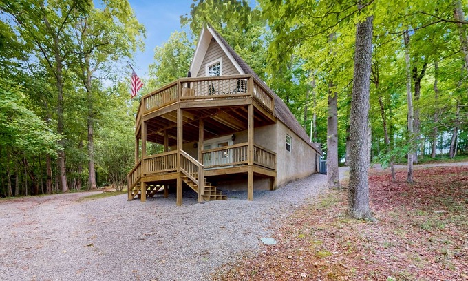 Flat Hollow Marina House | Cozy A-frame home with fire pit, deck, pickleball court, and covered boat slip