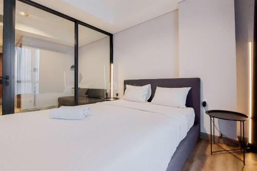 Pinang Apartment | Cozy and Elegant 1BR The Smith Alam Sutera Apartment By Travelio