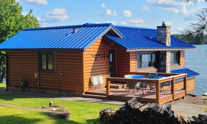 Arbor Vitae Cabin | Cozy boat house on the lake! Private dock and beautiful water views!