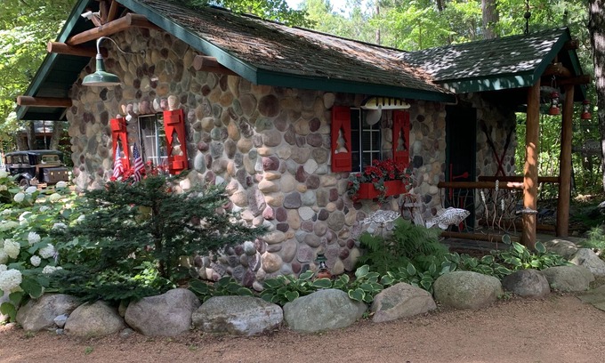 Woodruff Cottage | Cozy cabin gas fire place heated floors perfect for snowmobiling on trail 51