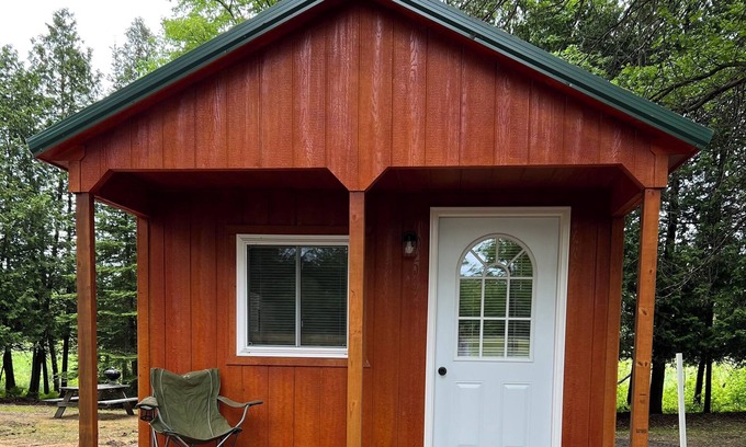 Lake Cabin | Cozy cabin in the woods on our own private lake with WIFI, A/C & Heat.