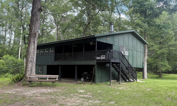 Fluker Cabin | Cozy Camp w/fire pit, grill and waterfront view of river. Pet Friendly!