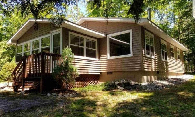 Charlevoix Cottage | Cozy Cottage on a Private Wooded Lot, Steps From Lake Charlevoix Waterfront!