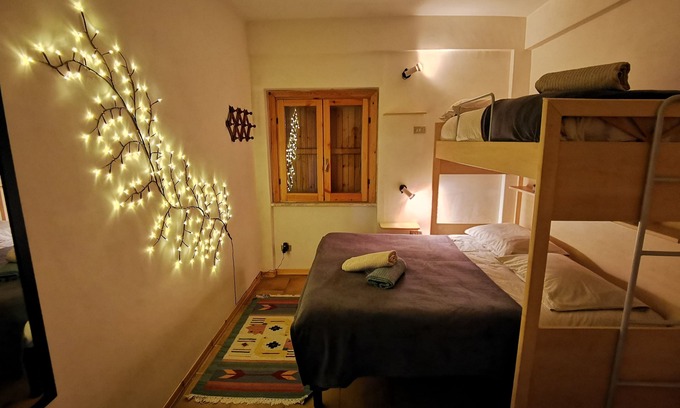 Camigliatello Apartment | Cozy flat with balcony & fireplace in Camigliatello