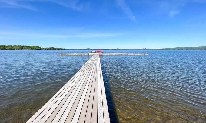 Newport Center Apartment | Cozy Lakeside Condo with a heated pool!
