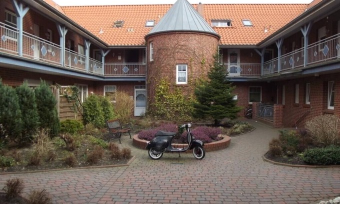 Großheide Apartment | Cozy little attic apartment with balcony and loggia near the coast