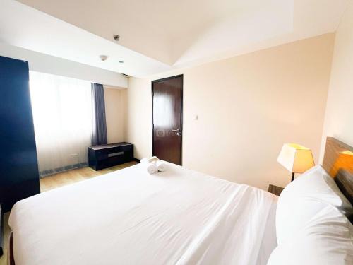 Braga Apartment | Cozy Living and Spacious 2BR Apartment Braga City Walk By Travelio