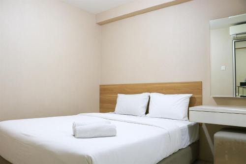 Pluit Apartment | Cozy Living and Tidy 2BR Green Bay Pluit Apartment By Travelio