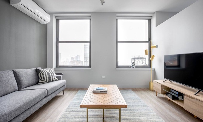 The Loop Apartment | Cozy Loop 1BR w/Deck, Gym, W/D, nr. West Loop & the L, by Blueground