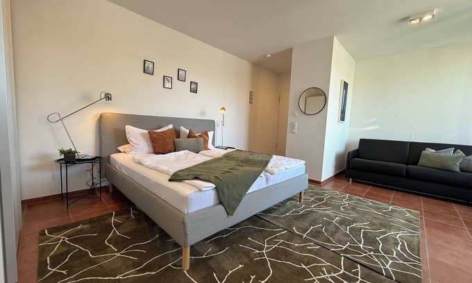 Petershausen-Ost Apartment | Cozy penthouse with lake view in Constance - your favourite place!