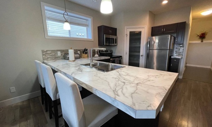 Grande Prairie House | Cozy Private Suite | Free WIFI | Stocked Kitchen