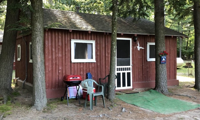 Pentwater Cabin | Cozy "Sailing" Cabin in the woods with Pentwater Lake frontage and access