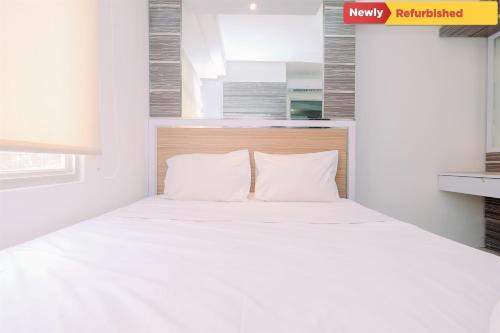 Pluit Apartment | Cozy Stay 2BR Green Bay Pluit Apartment By Travelio