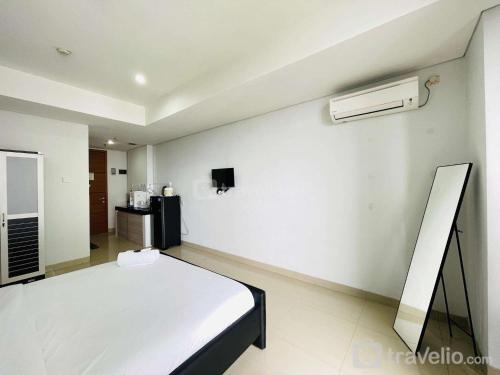 Dago Apartment | Cozy Studio Room at Dago Suites By Travelio