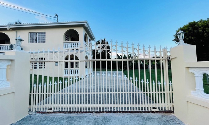 Estate Marys Fancy House | Cozy tropical retreat minutes from dining shopping and the beach!
