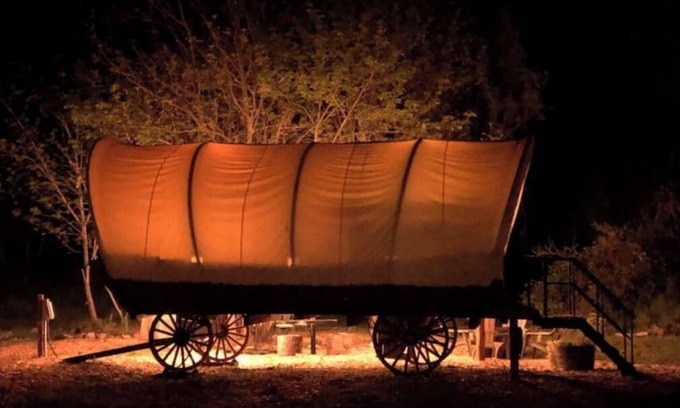 Murphy House | Cozy Wild West Covered Wagon next to River