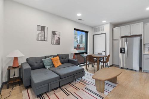 Lockerbie Square Apartment | CozySuites Mass with parking lounge & roof deck #29