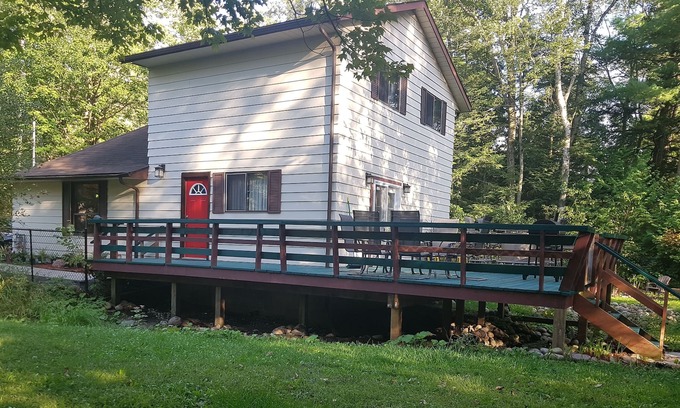 Balm Beach House | Creek Chalet at Balm Beach with Hot Tub & Sauna