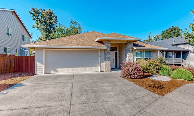 Gresham House | Custom-built home alongside greenspace with deck & massage chairs