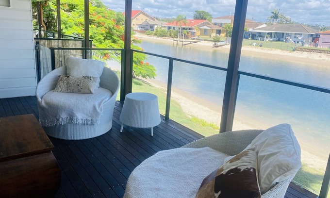 Palm Beach House | Cute Canal Front Duplex, 300m to the Beach, Pet Friendly