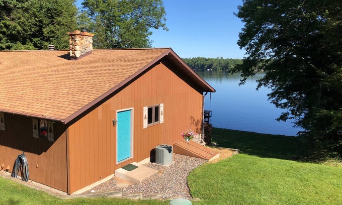 Eagle River House | Dam Lake Home ~ Steps from the waters edge on the Sugar Camp Chain