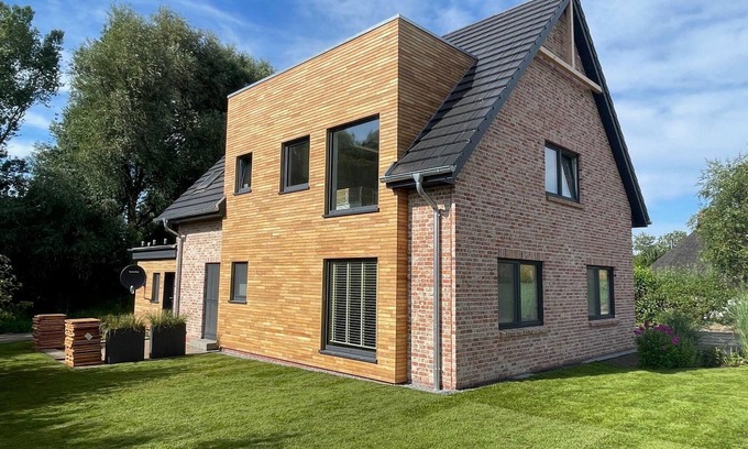 Toenning Apartment | Deichkoje12 direkt am Eiderdeich, nur 7 km bis zur Nordsee und 20 Min. bis Sankt Peter Ording