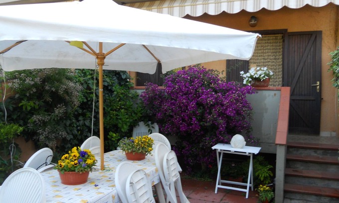 Porto Ercole Apartment | Delightful apartment in cottage with garden in the heart of Porto Ercole