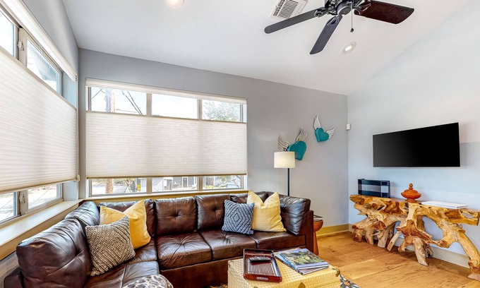 East Cesar Chavez Cottage | Delightful cottage in eclectic neighborhood with W/D, downtown views, & parking
