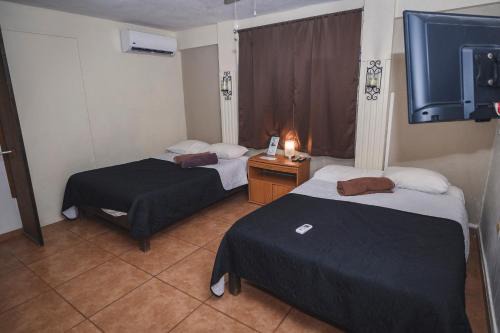 Zona Centro Apartment | Departamento CENTRICO, Tv smart, minisplit nuevo, wifi 100 mb, cocina, lavadora, asador, parking, letra i