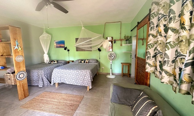 ProCab House | Design Garden Loft close to beach, lush tropical garden w. kite lesson