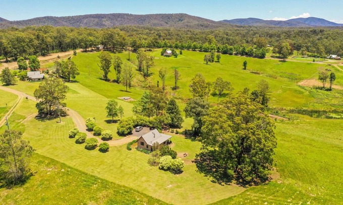 Possum Brush House | Designed for a romantic escape hidden behind the trees.