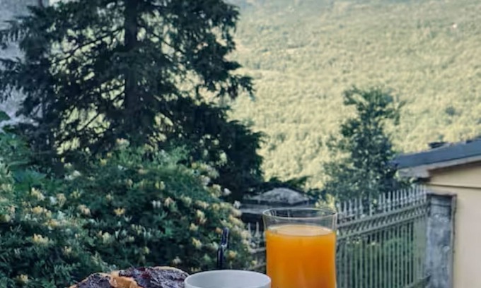 Caramanico Terme House | Designer home with artistic soul, a panoramic garden overlooking the mountains.