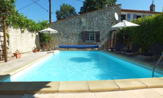 Cherbonnieres Cottage | Detached country cottage with private heated pool & charming walled garden