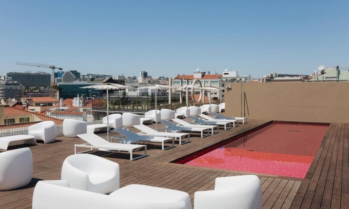 Sao Jorge de Arroios Hotel | Dive into Lisbon Nights: Rooftop Pool & Magical Light Show Views