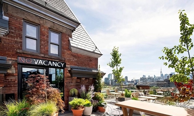 Riverside Hotel | Dive Into Your Dream Vacation! Prime East End Location, Rooftop Bar, Restaurant